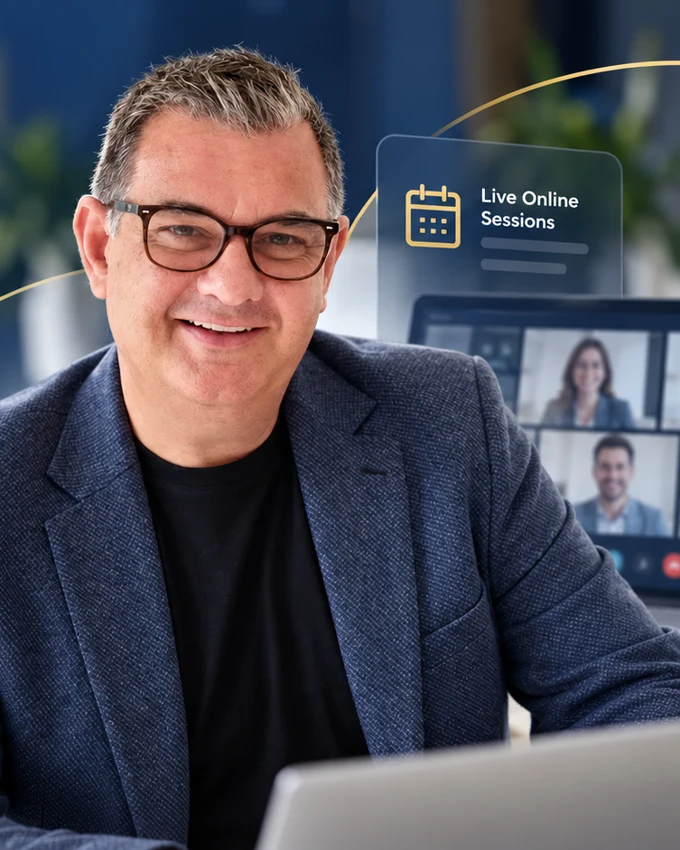 Mark Kilroy, Founder & CEO of Koste, seated at a laptop